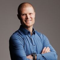 Professional headshot of Dennis Ashford