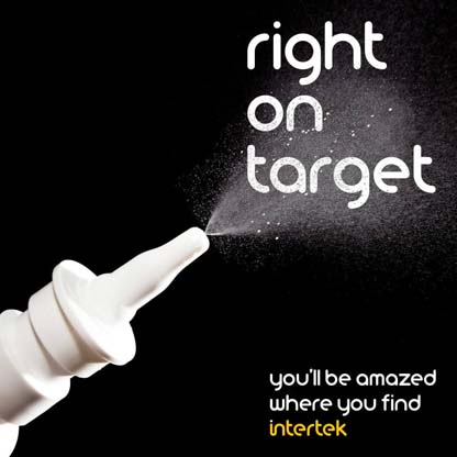 A nasal spray blowing fine mist into the air